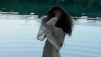 A Bride-to-Be samples the twilight clear waters at The Coffey Grounds after the Wedding Shoot for a Bridal Magazine