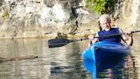 Lt. Col. (USAF Ret.) Dave Dunlap enjoys kayaking around the magnificent cliffs standing guard over the pristine waters at The Coffey Grounds