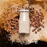 image of plant milk and milk in coffee