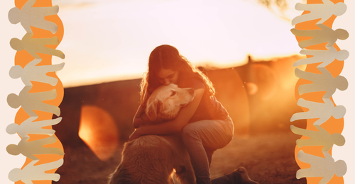 human hugging dog