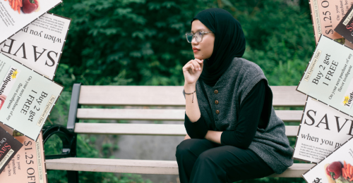 human sitting on bench