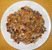 Plantain and Brown Rice with Corn, Onions, Peas, Sweet Potatoes, Raisins, and Spice