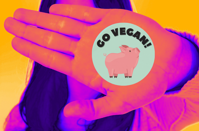 image of palm of hand with vegan sticker
